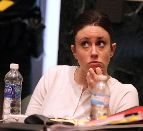 casey anthony trial photos crime scene. Casey Anthony listens to