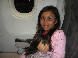american-girl-002gabriella-on-the-early-morning-flight-from-orlando-to-new-york-it-is-still-dark-outside