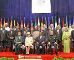 Britain’s Queen Elizabeth II (front row, second from left) and Commonwealth Secretary-General Kamalesh Sharma (front row, right) pose for a group photograph with leaders ahead of the Commonwealth Heads of Government Meeting in Port-of-Spain, Trinidad, on Friday. 