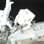 Spacewalkers Mike Foreman and Robert Satcher work on the exterior of the International Space Station during the first spacewalk of the STS-129 mission. Photo credit: NASA TV