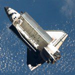 Space shuttle Atlantis flies around the International Space Station after undocking. Photo credit: NASA