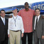 Orlando Magic Chief Operating Officer Alex Martins, AirTran Airways Sr. Vice President of Marketing and Planning Kevin Healy, Orlando Magic center Dwight Howard and AirTran Airways Chairman, CEO and President Bob Fornaro pose in front of the newest member of AirTran Airways' fleet, 'Magic 1.'