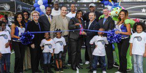 The Magic joined Chase on January 19 to cut the ribbon on their first court refurbishment project of their newly announced Champions of the Community (COTC) partnership.  The COTC partnership will bring the Chase experience to fans and customers at Amway Center and seek local outreach opportunities to impact and benefit the Central Florida community.  Included in the photo: Chase Market Leader and President of Middle Market Mike Dosal, Magic guard Arron Afflalo, Magic VP of Corporate Partnership Sales Michael Forde, Magic VP of Community Relations and Government Affairs Linda Landman Gonzalez, Magic Community Ambassadors Nick Anderson and Bo Outlaw, Magic Dancers, STUFF the Magic Mascot, Orange County Public Schools (OCPS) Superintendent Dr. Jesus Jara, Florida State Representative Randolph Bracy, OCPS area Superintendent Bridget Williams and Pine Hills Elementary Principal Dr. Cheryl Britton along with students from Pine Hills Elementary and local Boys & Girls Club members.  Photo taken by Gary Bassing. 