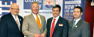 L-R: Robert H. (Bob) Brown, President & CEO, Heart of Florida United Way; Orlando Mayor Buddy Dyer, City of Orlando; Patrick Tolan, Professor of Law, Barry University; Bill Mills, Director of Strategic Initiatives, Florida Prosperity Partnership.   