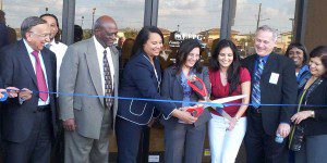 Dr. Nayana Vyas, founder, Family Physicians Group (c) cuts the ribbon to formally open Family Physicians of Rosemont, 5554 Clarcona-Ooee Road, Orlando. l-r: Dr. Andy Vyas, CEO/President-FPG, Dr. Tonya Young-Henley, Dr. Anjali Vyas, and Phil Ciufo. February 15, 2013 (Photo: WONO)