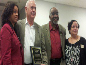 Jerry Kinzler of Turning Point, (second from left) displays his 2013 "Unsung Hero" Award. February 7, 203 (Photo: WONO)