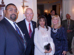 MLK Reception at Florida Governor’s Mansion, Tallahassee, Florida - From left to right: Paul Curtis, Curtoom Companies and Transportation Research Board Appointee, Honorable Rick Scott, Governor of Florida, Attorney Wilhelmina Curtis, Florida First Lady Ann Scott 