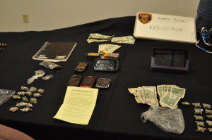 Firearms, narcotics, and ammo. collected from Eustis Housing Authority property (Photo: Eustis Police Department)