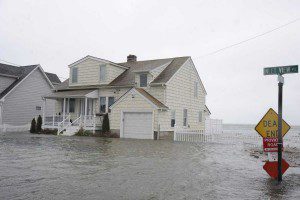 Photo credit: John Roca | Street scenes showing water about 3 feet deep as Moriches Bay floods at the intersection of South Ocean Avenue and Inlet View Road in Center Moriches as superstorm Sandy approaches. (Oct. 27, 2012)