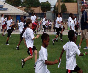 Camp kids undertake a drill at the Youth Football Combine, Bill Spoone Stadium, June 1, 2013 (Photo: WONO)