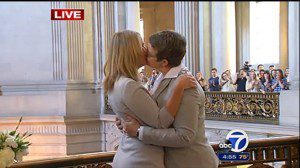 Sandy Stier (l) and Kris Perry kiss after getting married in California, June 28, 2013. (Photo courtesy: the gailygrind.com)
