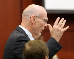 Defense counsel Don West throws up his hands in frustration after a late night court session in the George Zimmerman trial in Seminole circuit court, in Sanford, Fla., late Tuesday, July 9, 2013. Zimmerman is charged with 2nd-degree murder in the fatal shooting of Trayvon Martin, an unarmed teen, in 2012. (Joe Burbank/Orlando Sentinel/POOL) 