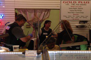 OCSO deputies inventory items inside a jewelry store whose owners are suspected of dealing in stolen goods, July 25, 2013. (Photo: WONO)