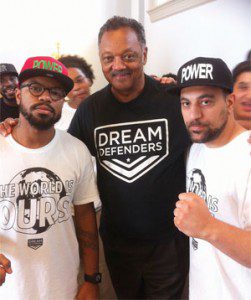 The Rev. Jesse Jackson, center, encourages Dream Defenders Executive Director Phillip Agnew and Legal and Policy Director Ahmad Abuznaid at Gov. Rick Scott’s office.  (SPECIAL TO THE FLORIDA COURIER)