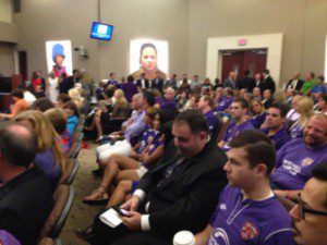 Supporters of the proposed Orlando City Soccer Stadium, sporting purple jerseys, packed the Orange County Commissioners Board meeting, August 6, 2013 (WONO)