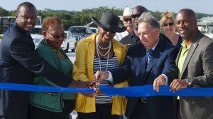 l-r:  Rep. Randolph Bracy, Sen. Geraldine Thompson, Orlando City Commissioner Daisy Lynum, Alan Hyman FDOT Director of Operations D5, Eatonville Town Councilman Alvin Moore, cut the ribbon to unveil John Young Parkway/SR 423 Extension, September 19, 2013. 