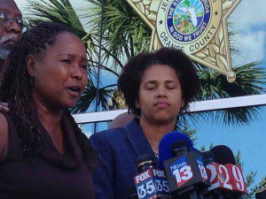 Lillie Danzy (l), mother of escaped convict, Charles Walker, makes an appeal for him to turn himself in to law enforcement, peacefully. Rhonda Henderson (r), an attorney for Danzy, stands beside her at the Orange County Sheriff's Office, October 18, 2013. (Photo: WONO)