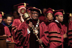 Dr. Edison O. Jackson holds the mace during his inauguration as President of Bethune-Cookman University at the Performing Arts Center, in Daytona Beach, October 16, 2013. (Photo credit: News-Journal/David Massey)
