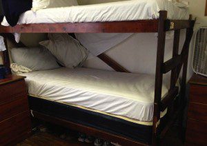 A bedroom at Recovery House where two men share one of two bunk beds in a room. October 3, 2013 (Photo: WONO)