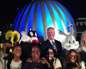 Global Convergence - Orlando Mayor Buddy Dyer stands with kids in front of the 12' globe. (Photo: WONO)
