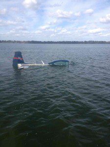 Eric McCoy's plane partially submerged in Lake Hancock