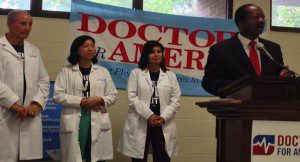 City of Orlando Commissioner Sam Ings joins Doctors for America at enrollment fair in Orlando.  2nd from left: Dr. Alice T. Chen, Executive Director, Doctors for America and Dr. Mona Manget, Chair, Doctors for America, at Smith Community Center, Orlando, February 22, 2014. (Photo: WONO)