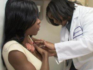 woman-being-examined-by-doctor