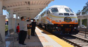 File photo: Guests boarded and toured SunRail during the preview celebration of Sand Lake Road station (Photo: Orange County government)