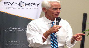 Former Charlie Crist addresses the crowd at an open house reception hosted by Synergy Settlement Services, 911 Outer Road, Orlando, June 26, 2014. (Photo: WONO)