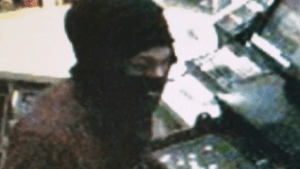 Surveillance footage of masked man 