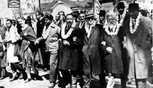 Martin Luther King Jr. marching in Selma, Alabama, alongside Rabbi Abraham Joshua Heschel and other civil rights activists. 