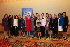 Members of Heart of Florida United Way’s Women’s Leadership Council posing with Cheryl Strayed (center in red)