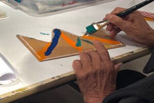 Art Program Attendee with Alzheimer’s paints a Basquiat-inspired crown piece